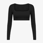 Flat lay of the Fitfigura Freedom Scoop Long Sleeve Crop Top in black, showing the long sleeves, scoop neckline, and cropped shape.