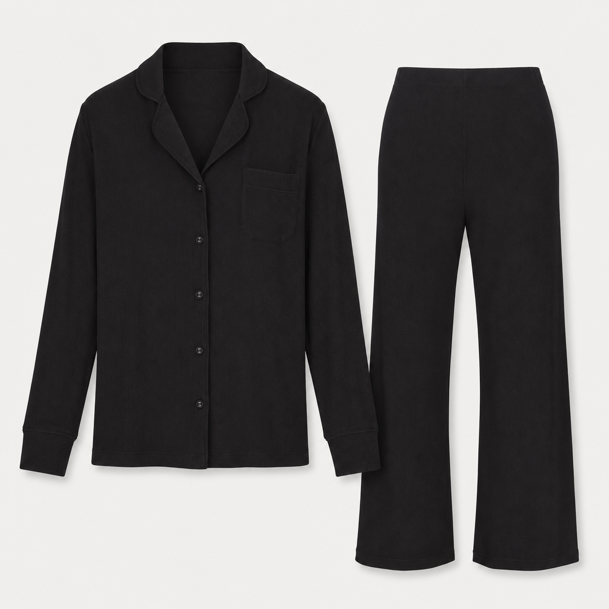 Flat lay of the FitFigura Soft LoungeWear Set – Comfort Form in Onyx Black, showing the button-up long-sleeve top and matching wide-leg lounge pants.