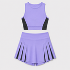 Flat lay of the Fitfigura Ace Motion Performance Set – Sculpt Match Form in light purple, featuring a sleeveless crop top and matching pleated skirt.