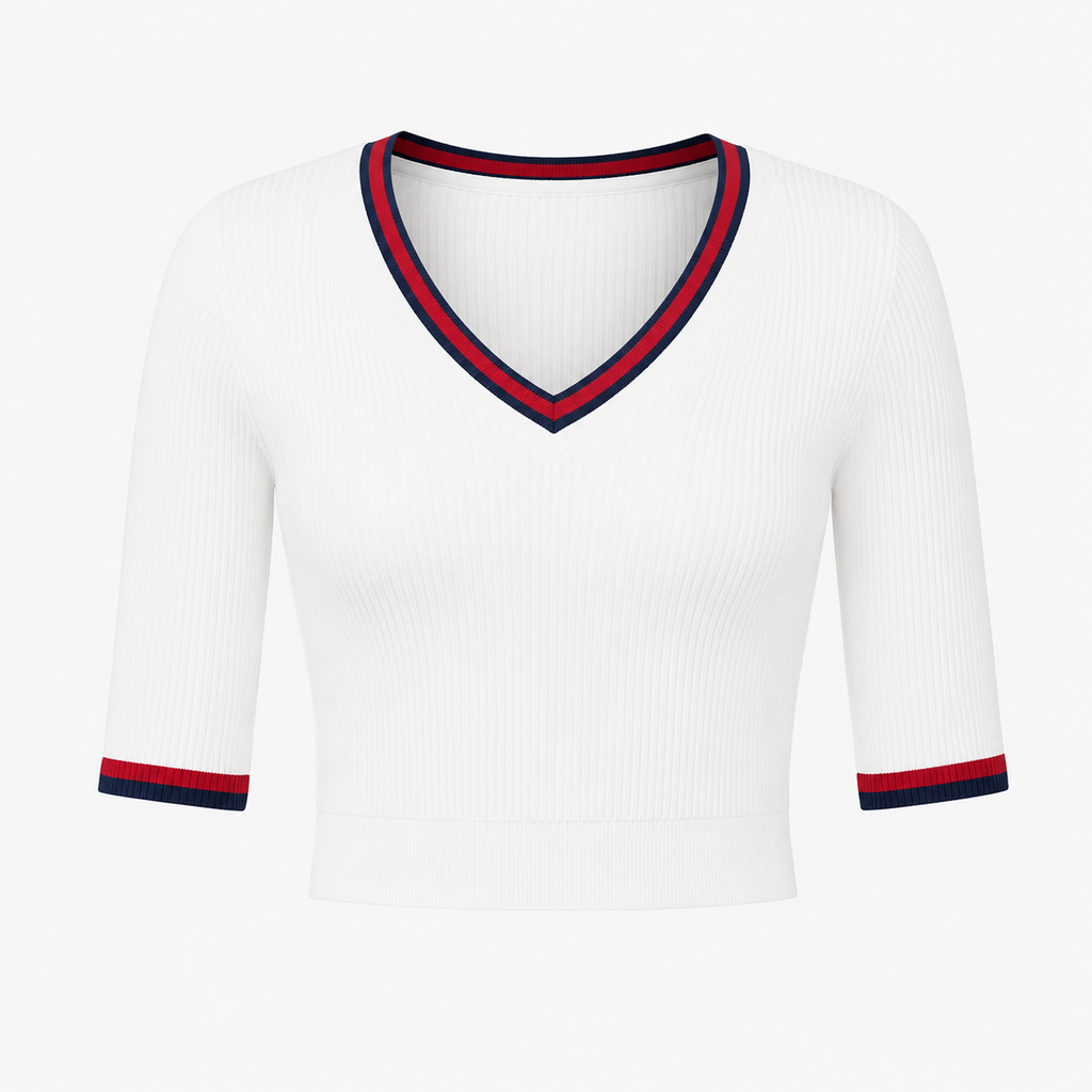 Flat lay of the white Fitfigura Ace Set – Signature Court Form top, featuring a V-neckline with contrast trim and short sleeves.