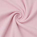 Close-up of the soft light pink fabric texture used in the Fitfigura Ace Skirt – Pleated Form.