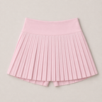 Flat lay of the Fitfigura Ace Skirt – Pleated Form in light pink, showing the pleated design and wide waistband.