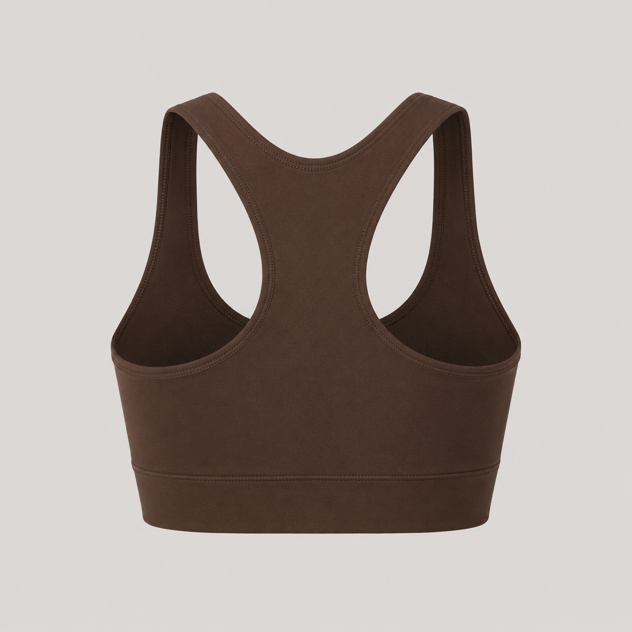 lat lay of the Fitfigura Contour Bra – Defined Sculpt in dark brown, showing the racerback shape and supportive bra construction.
