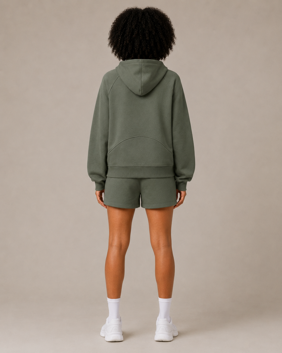 Back view of the olive green Fitfigura Core Hoodie – Essential Form with matching shorts, showing the full rear silhouette.