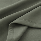 Close-up of the olive green fabric texture used in the Fitfigura Core Hoodie – Essential Form.