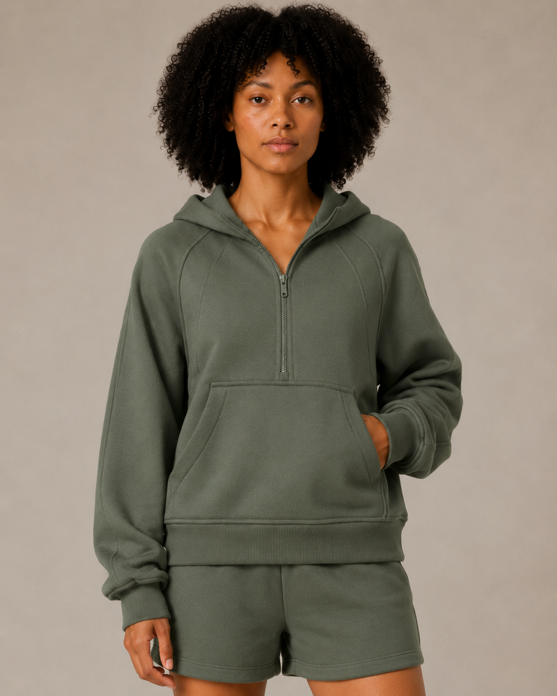 Close-up front view of the Fitfigura Core Hoodie – Essential Form in olive green, showing the hood, neckline, and soft oversized fit.