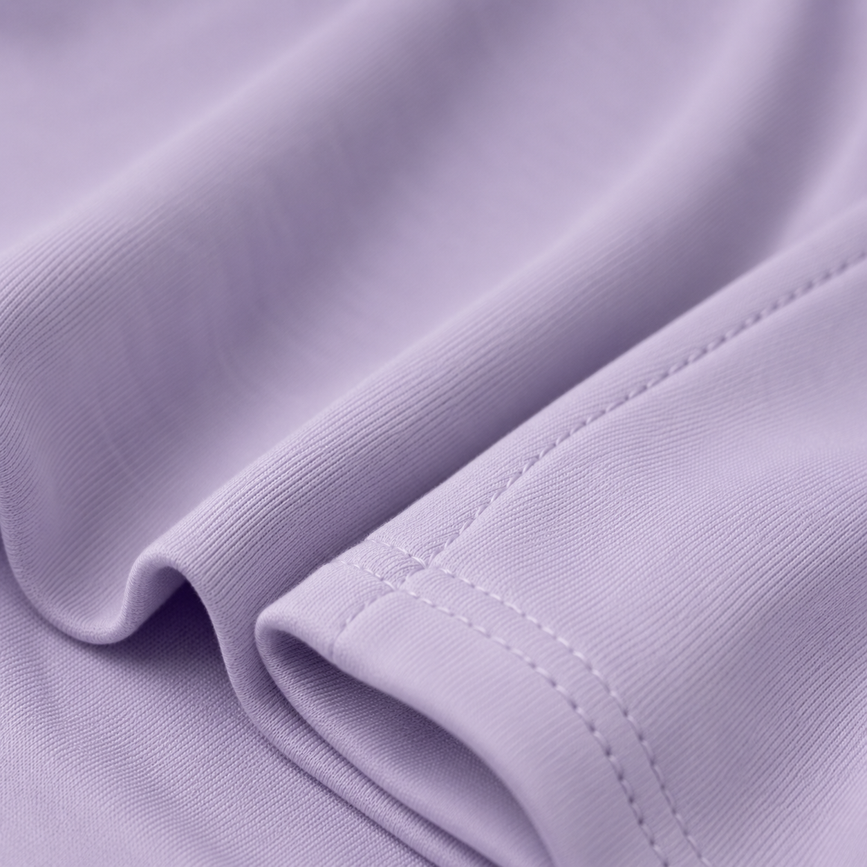 Close-up of the soft light purple fabric texture used in the Fitfigura Core Loungewear Set – Essential Form.