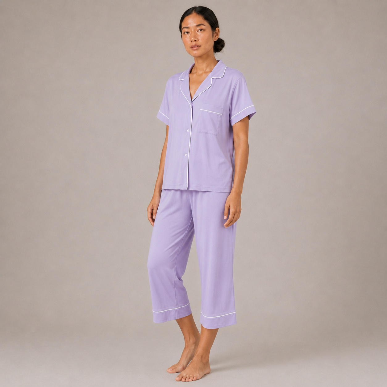 Model walking in the light purple Fitfigura Core Loungewear Set – Essential Form, highlighting the soft drape and relaxed lounge fit.