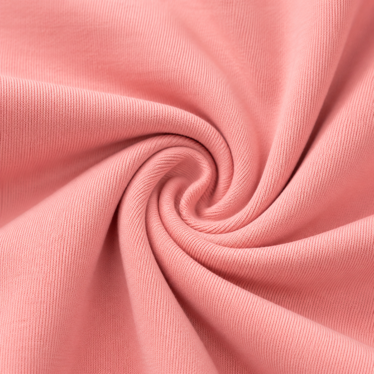 Close-up of the coral pink fabric texture used in the Fitfigura Core Set – Minimal Sculpt Form.