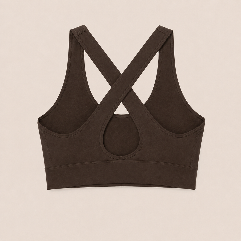 Flat lay back view of the dark brown Fitfigura Crossback Bra – Sculpt Line, highlighting the crossback straps and keyhole detail.