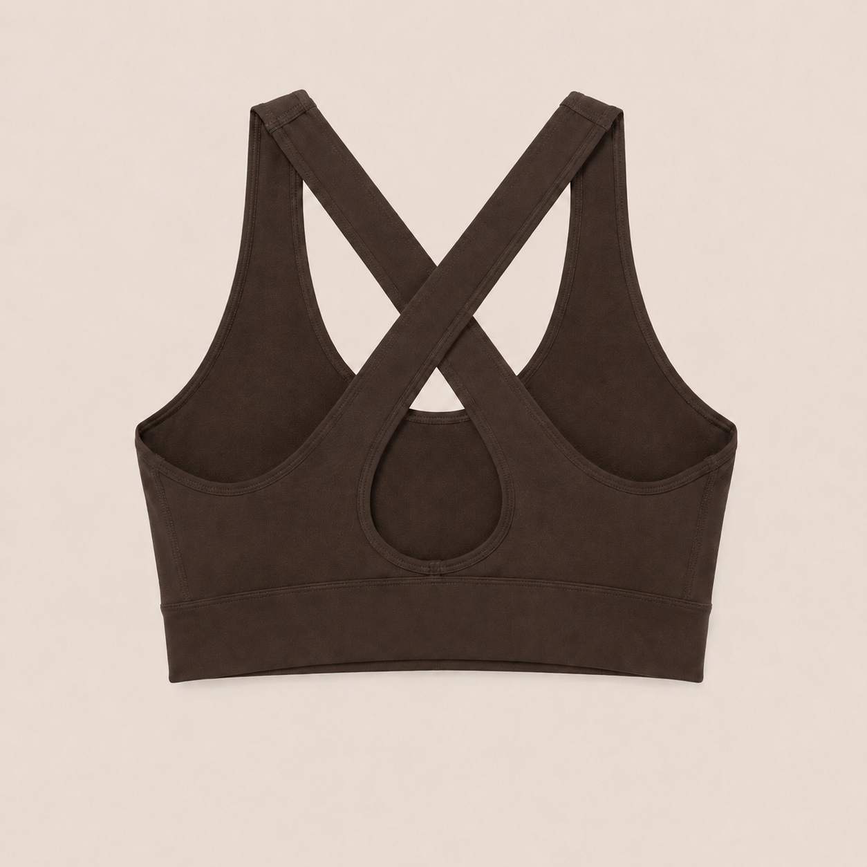 Flat lay back view of the dark brown Fitfigura Crossback Bra – Sculpt Line, highlighting the crossback straps and keyhole detail.