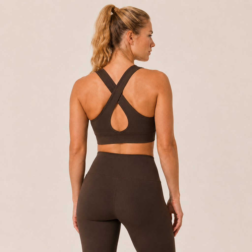 Back view of the dark brown Fitfigura Crossback Bra – Sculpt Line, showing the crisscross strap design and supportive back fit.