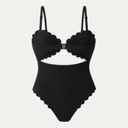 Flat lay of the Fitfigura Cutout One-Piece – Modern Edge Form in black, featuring adjustable straps, cutout front, and gathered bust design.