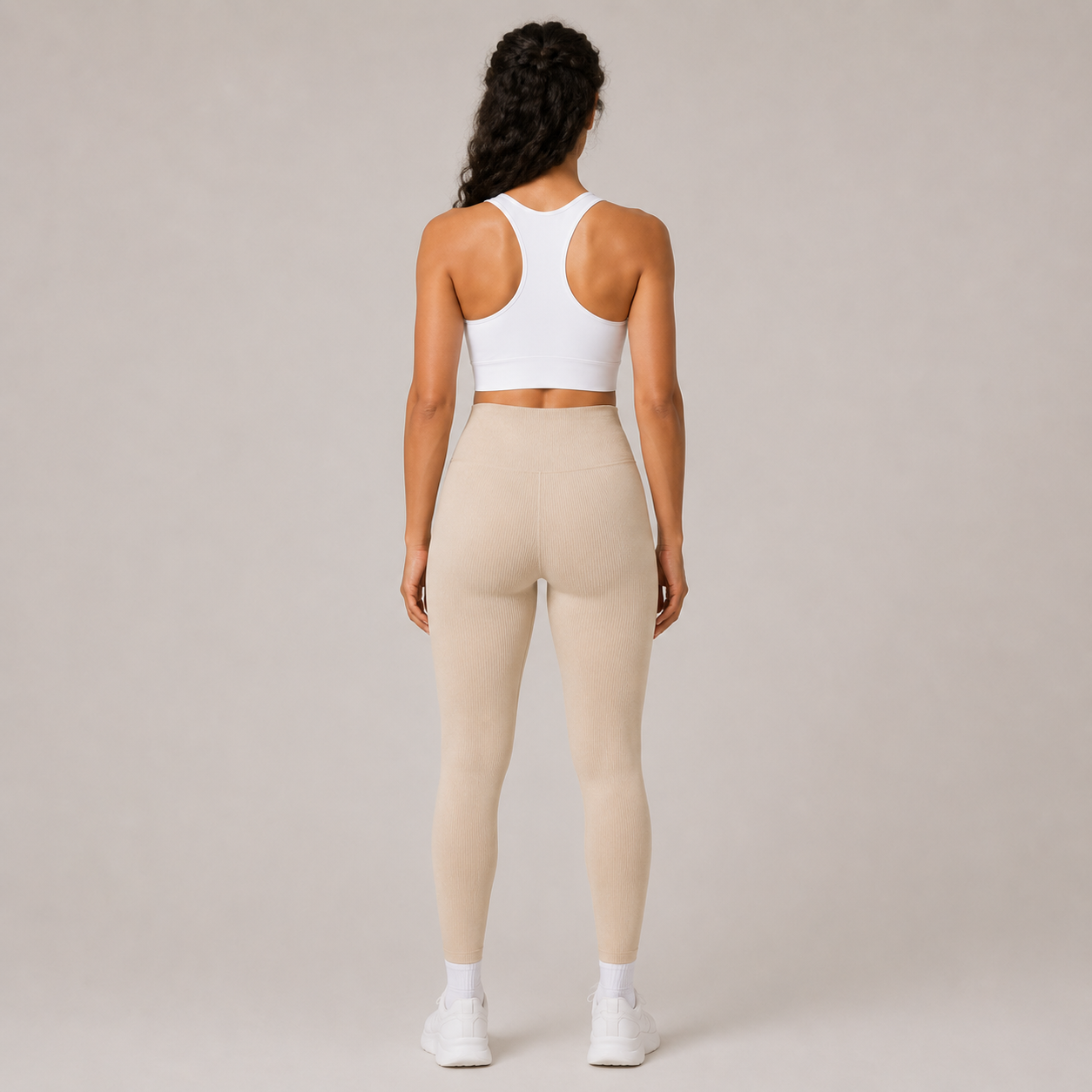 Back view of the cream Fitfigura Flex Rib Legging, showing the smooth rear fit and full-length leg design.