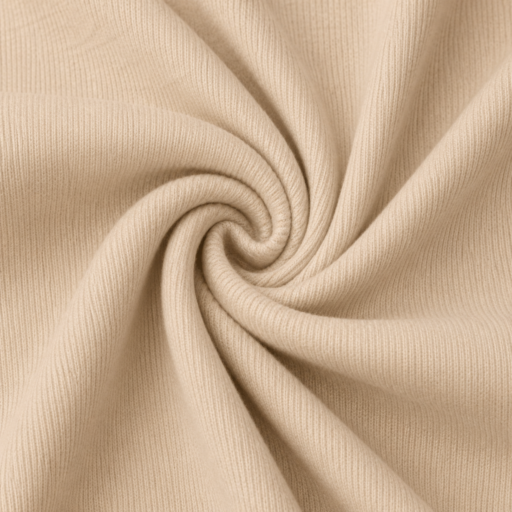Close-up of the cream ribbed fabric texture used in the Fitfigura Flex Rib Legging.