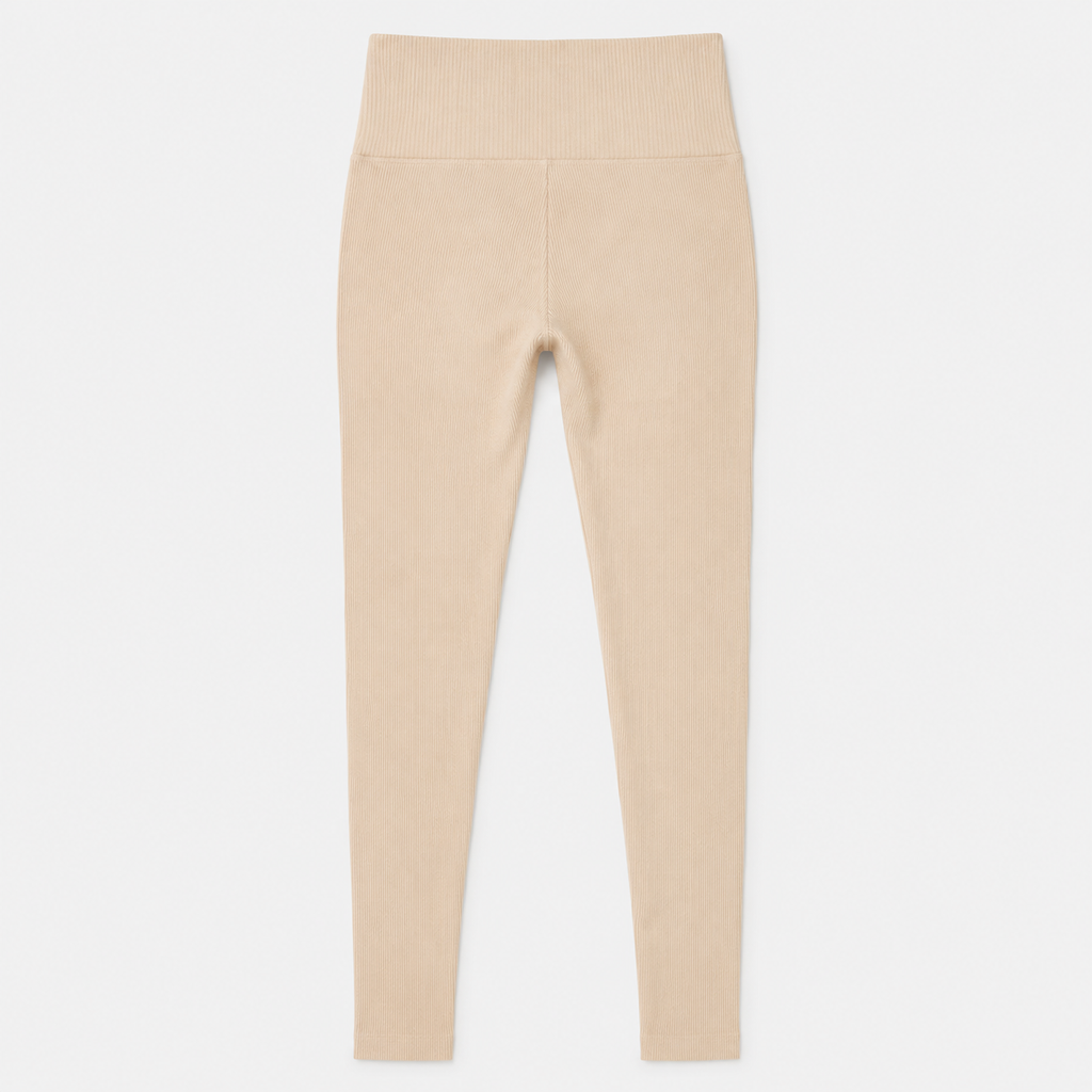 Flat lay of the Fitfigura Flex Rib Legging in cream, showing the high waistband and full-length ribbed legging design.
