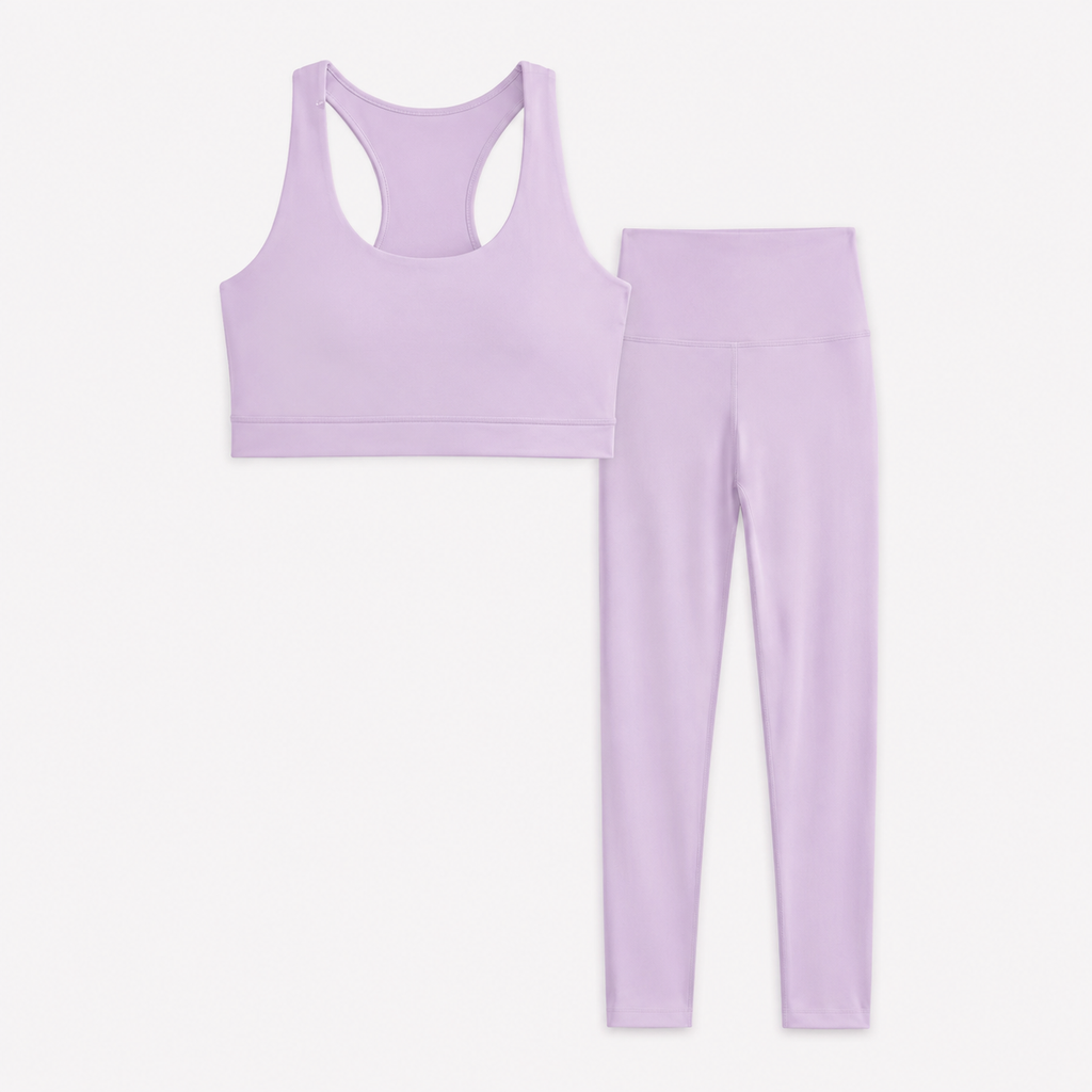 Flat lay of the Fitfigura Flow Performing Set – Soft Movement Form in light purple, featuring a sleeveless crop top and matching leggings.