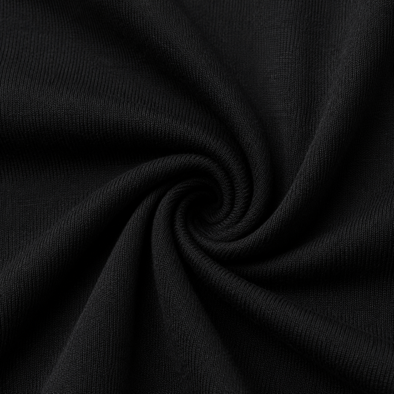 Close-up of the black fabric texture used in the Fitfigura Freedom Scoop Long Sleeve Crop Top.