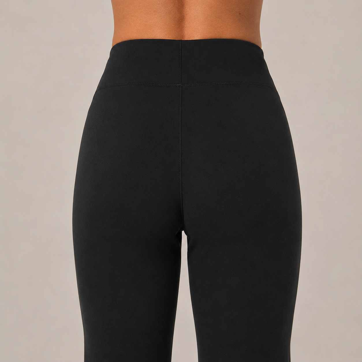 Close-up of the black Fitfigura Lounge Flare Pant – Relaxed Luxury Form showing the high waistband and smooth fitted upper silhouette.