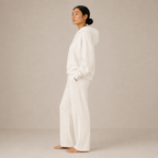 Full-body side profile of the Fitfigura Lounge Oversized Hoodie – Soft Form, showing the relaxed hoodie and pant silhouette.
