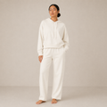 Model wearing the Fitfigura Lounge Oversized Hoodie – Soft Form in ivory with matching lounge pants, shown from the front.