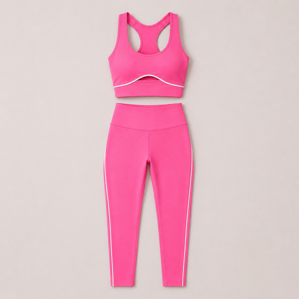 Flat lay of the Fitfigura LuxeSculpt™ Contour Legging Set in hot pink, featuring a matching sports bra and full-length leggings.