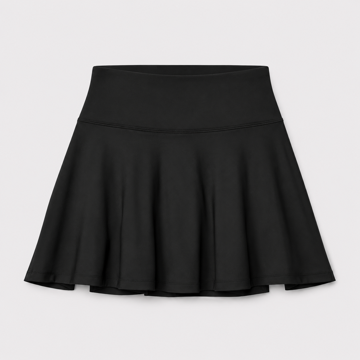 Flat lay of the Fitfigura Motion Skirt – Flow Court Form in black, showing the waistband and softly flared skirt design.