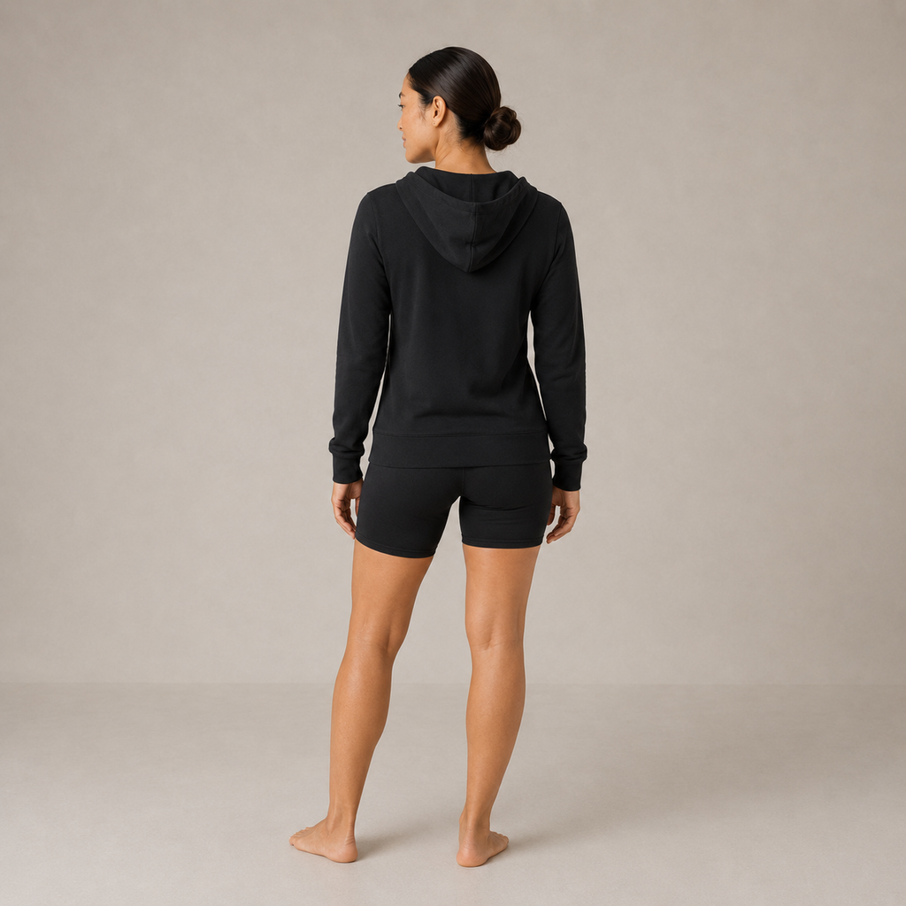 Back view of the black Fitfigura Performance Hoodie – Active Form paired with matching shorts.