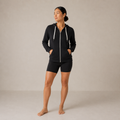 Model wearing the Fitfigura Performance Hoodie – Active Form in black with matching black shorts, shown from the front.