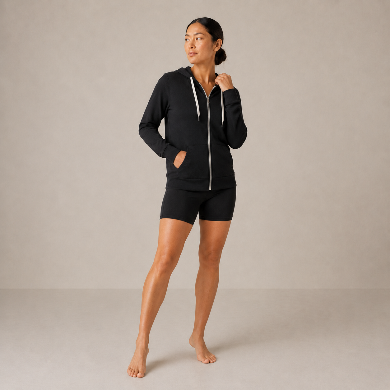 Full-body view of the black Fitfigura Performance Hoodie – Active Form styled with matching active shorts.