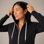 Close-up of the black Fitfigura Performance Hoodie – Active Form showing the hood, zipper, and drawstring details.