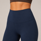 Close-up of the navy blue Fitfigura Pocket Legging showing the high-rise waistband and smooth contour fit.