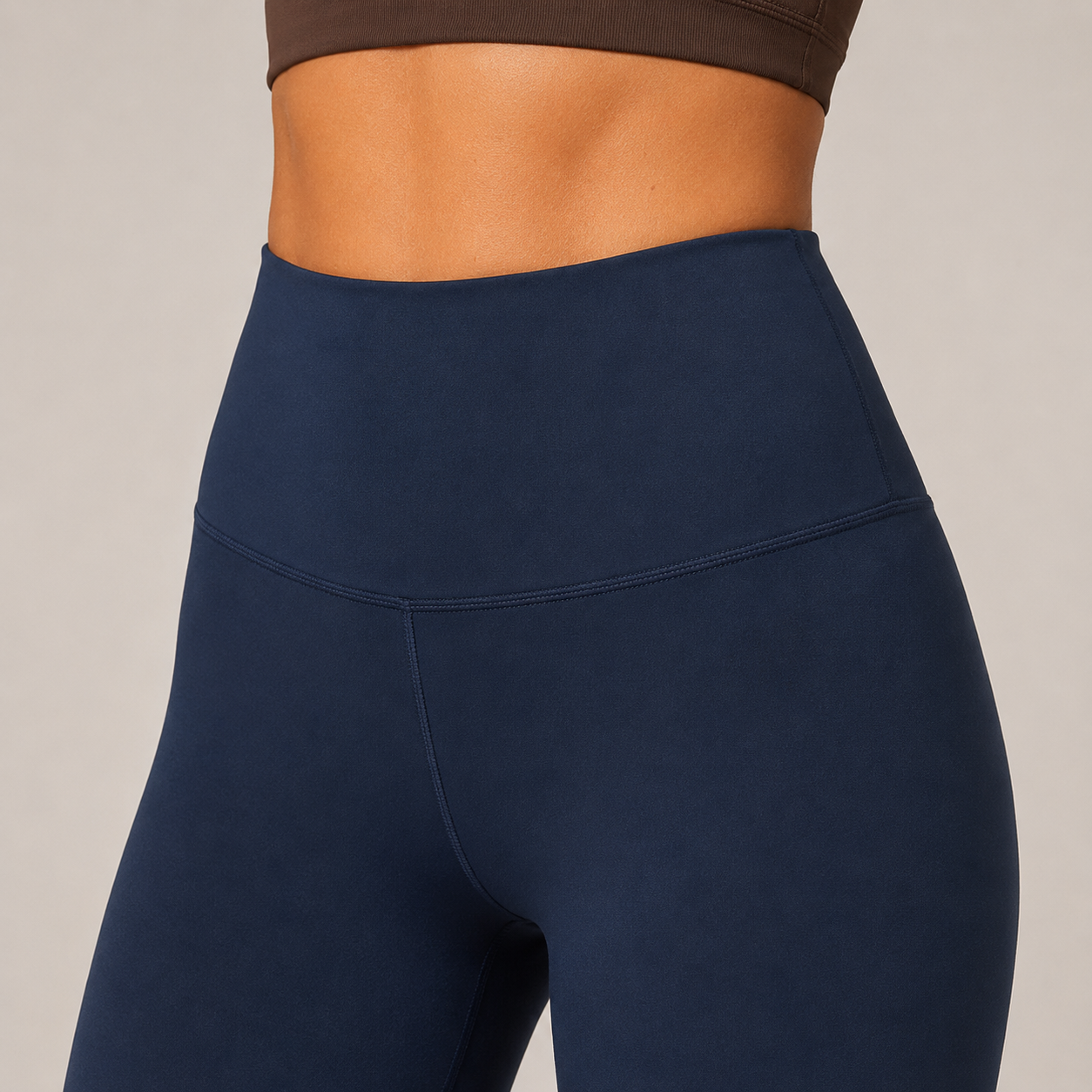 Close-up of the navy blue Fitfigura Pocket Legging showing the high-rise waistband and smooth contour fit.