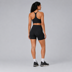 Back view of the black Fitfigura Pocket Short – Utility Performance Form, showing the high-rise waistband and smooth rear fit.