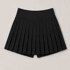Flat lay of the Fitfigura Rally Tennis Skirt – Sculpt Court Form in black, showing the pleated design and structured shape.
