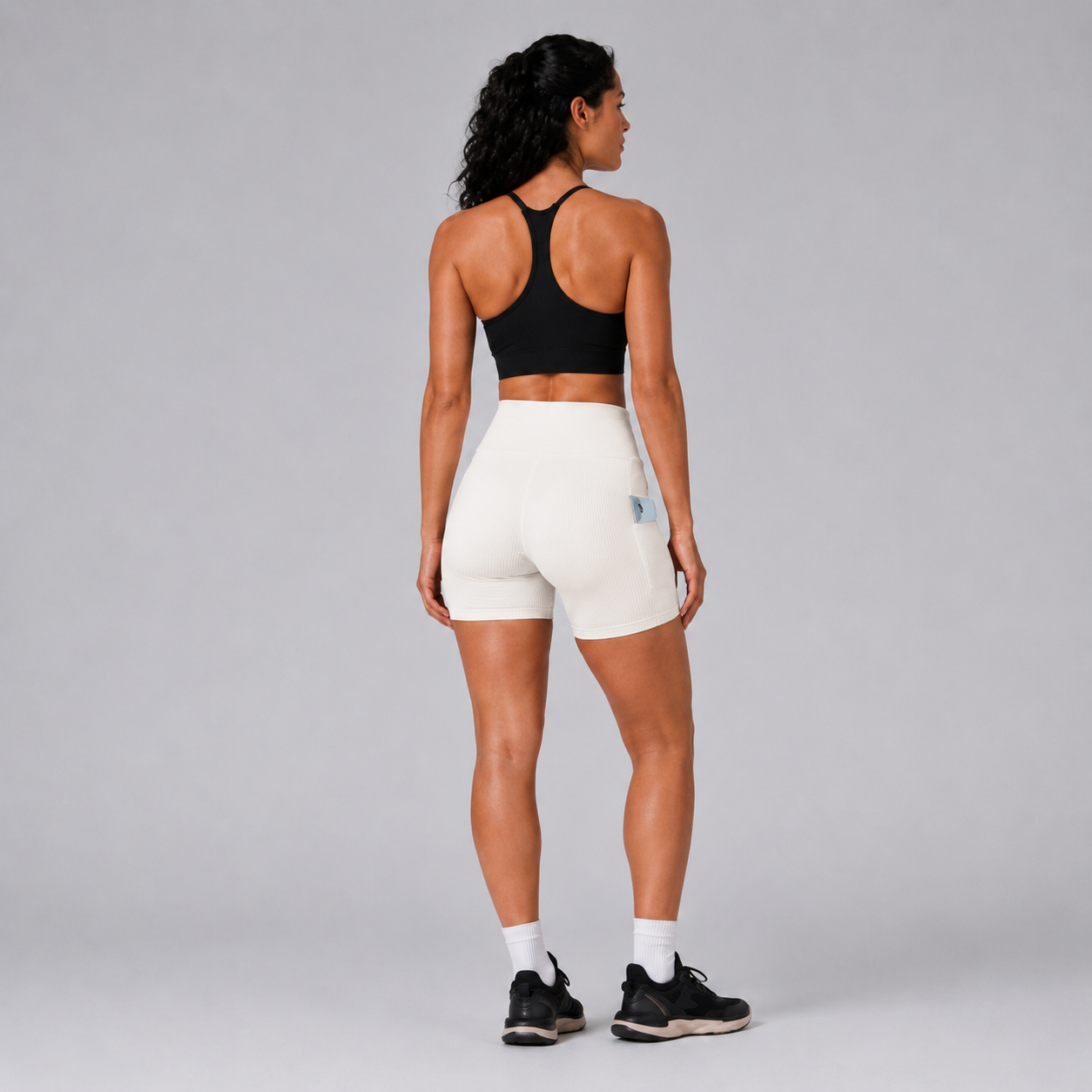 Back view of the white Fitfigura Rib Short – Soft Sculpt Form, showing the high-rise waistband and fitted rear shape.