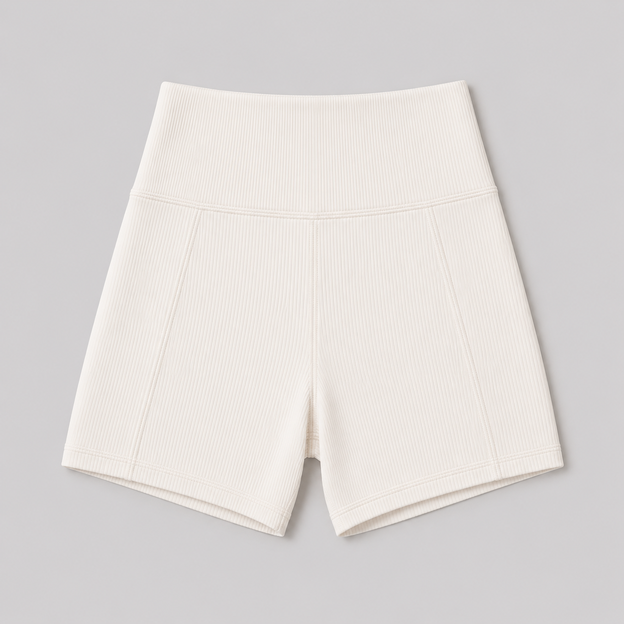 Flat lay of the Fitfigura Rib Short – Soft Sculpt Form in white, showing the high waistband, ribbed texture, and fitted short shape.