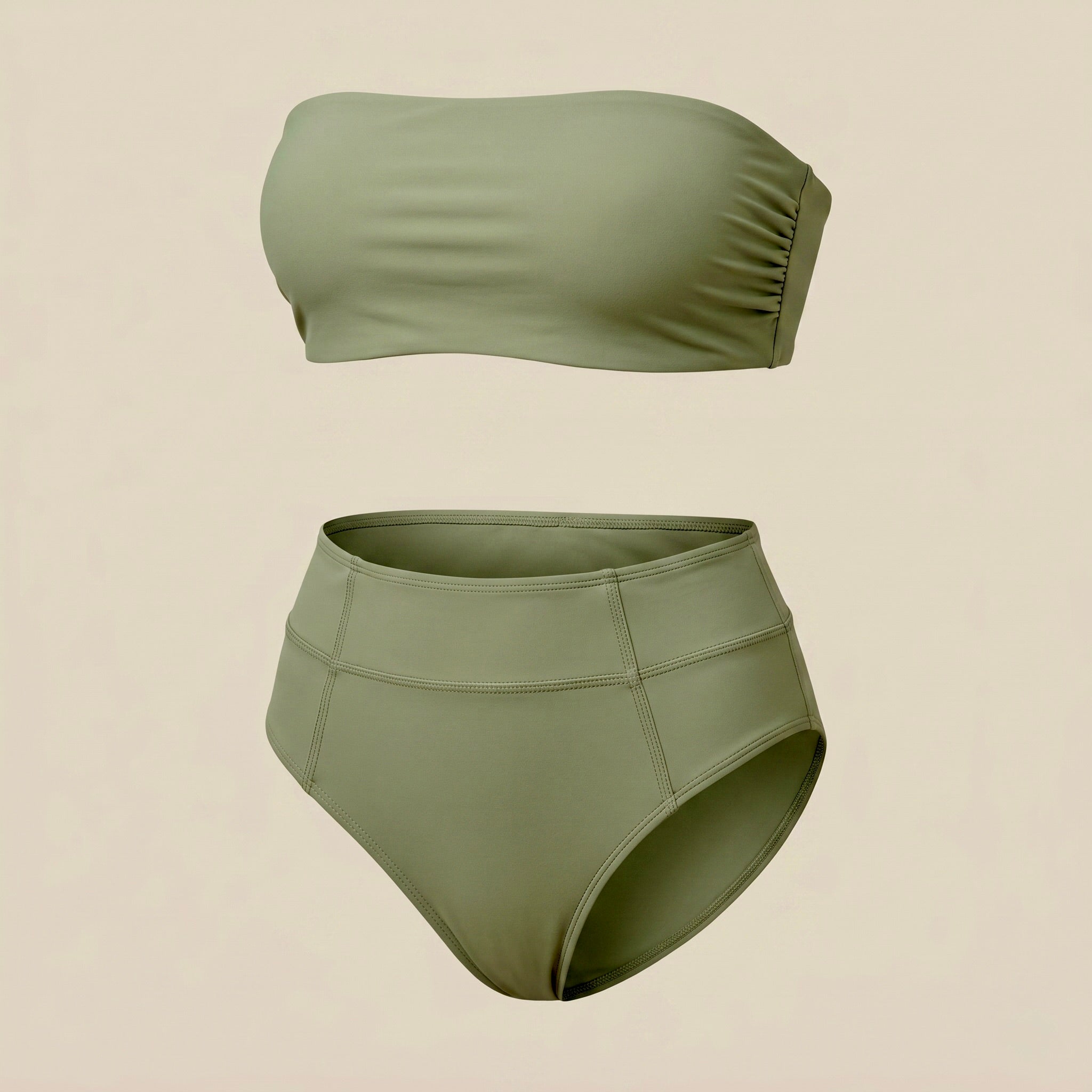 Flat lay of the Fitfigura Sculpt Bikini – Contour Form in sage green, featuring a bandeau-style bikini top and matching bottoms.