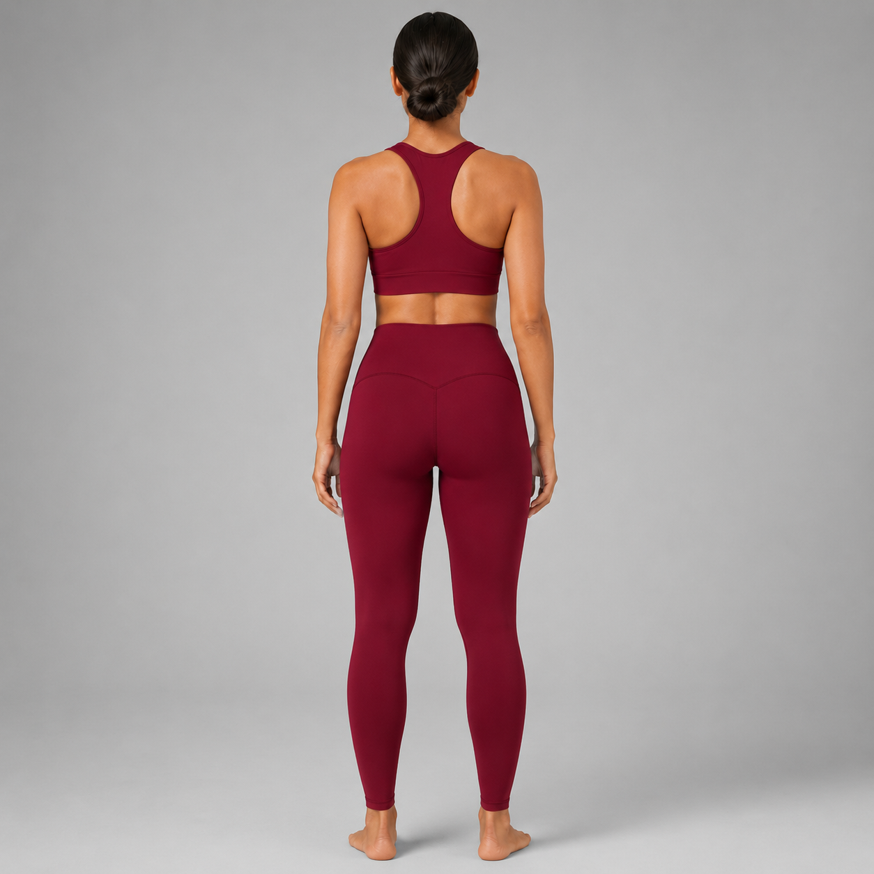 Back view of the Fitfigura Sculpt Butterlift Leggings in burgundy, showing the sculpted fit and high-rise waistband.