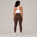 Back view of the dark brown Fitfigura Sculpt Legging, showing the rear fit and full-length legging shape.
