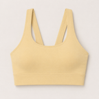 Flat lay front view of the Fitfigura Sculpt Set – Seamless Form sports bra in butter yellow, showing the scoop neckline and wide straps.