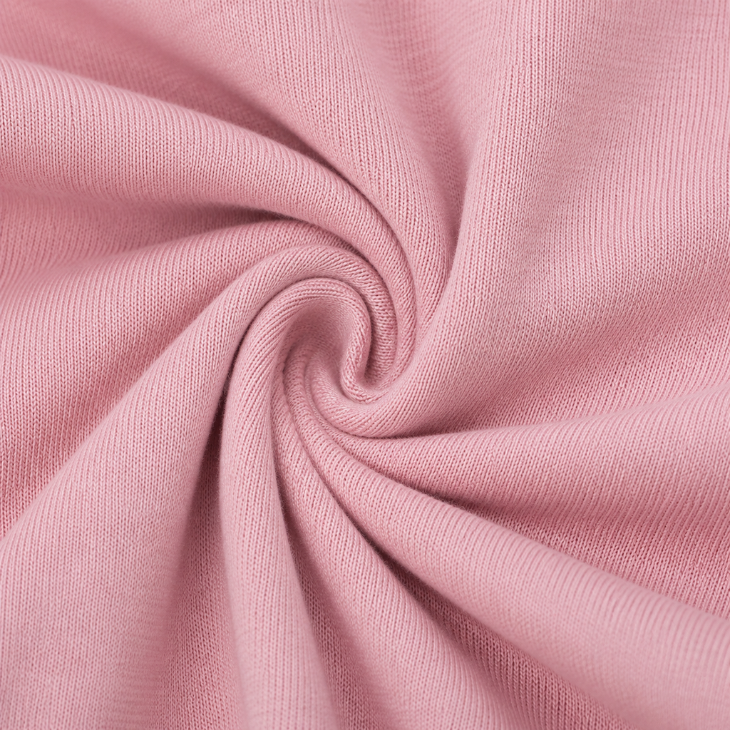 Close-up of the soft light pink fabric texture used in the Fitfigura Sculpt Short 6” – Performance Sculpt Form.