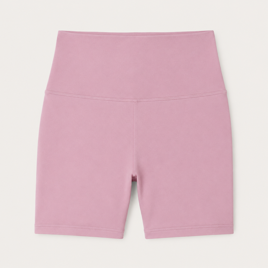 Flat lay of the Fitfigura Sculpt Short 6” – Performance Sculpt Form in light pink, showing the high waistband and fitted 6-inch short design.