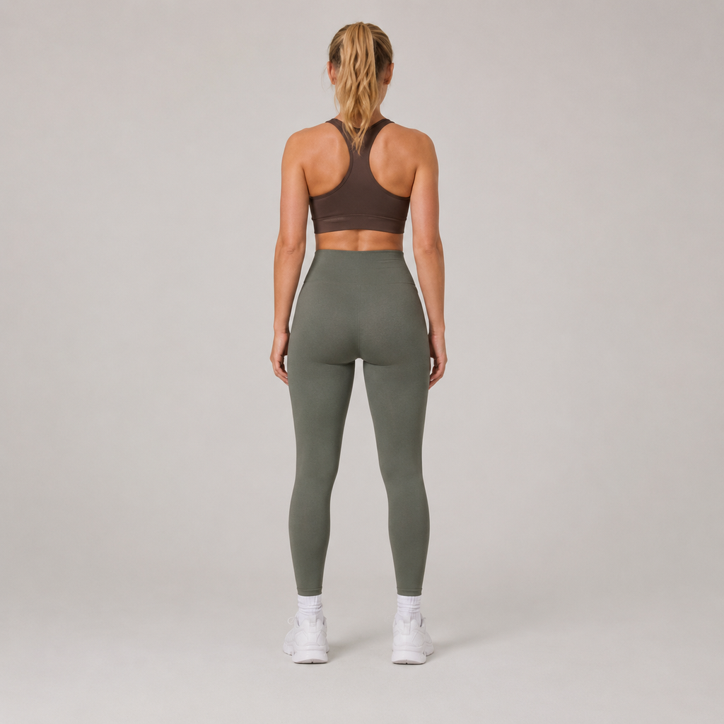 Back view of the olive green Fitfigura Seamless Legging, showing the rear fit and full-length legging shape.