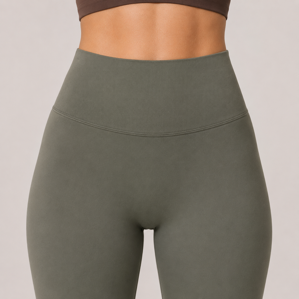 Close-up of the olive green Fitfigura Seamless Legging showing the high-rise waistband and sculpting fit.