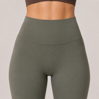 Close-up of the olive green Fitfigura Seamless Legging showing the high-rise waistband and sculpting fit.