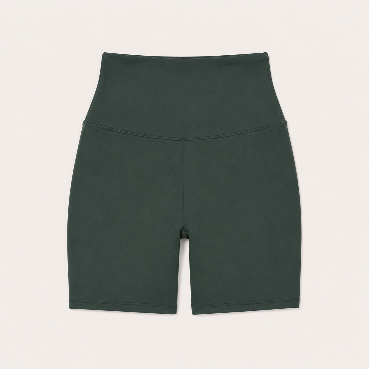 Flat lay of the Fitfigura Seamless Short – Athletic Form in dark green, showing the high waistband and fitted short length.