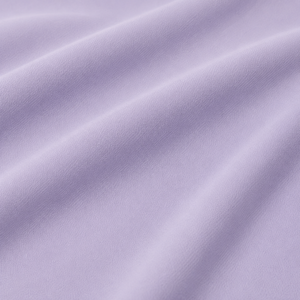 Close-up of the light purple fabric texture used in the Fitfigura Serve Dress – Elite Court Form.