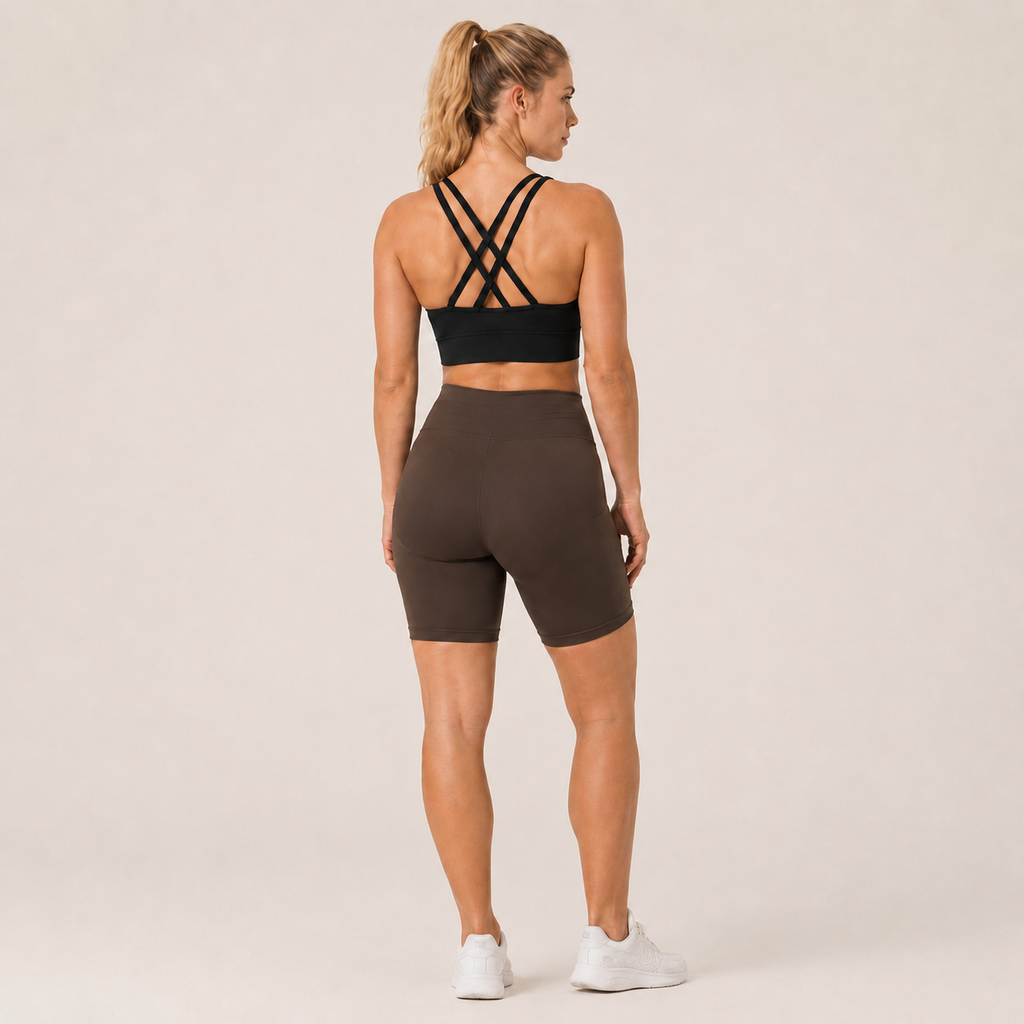Back view of the black Fitfigura Studio Bra – Soft Flow, showing the multi-strap back design and secure fit.