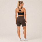 Back view of the black Fitfigura Studio Bra – Soft Flow, showing the multi-strap back design and secure fit.